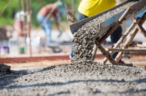 Concrete being poured at construction site